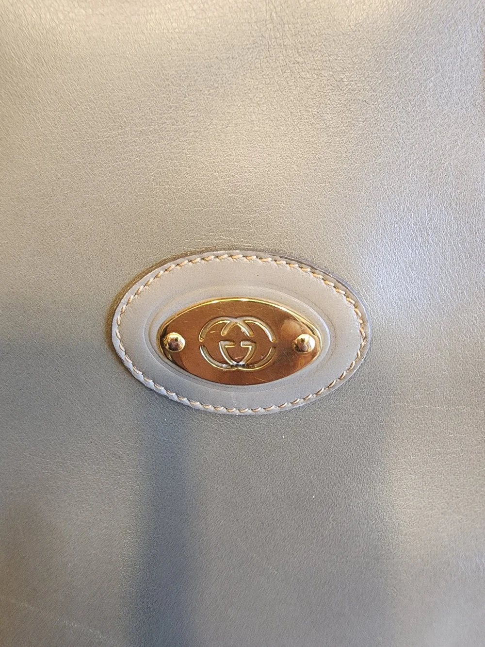vintage Gucci Interlocking G Top Handle Bag, crafted from neutral beige leather